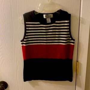 100% cotton sleeveless top. Red, black and smokey gray.